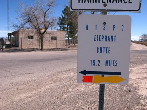 go north for Elephant Butte, south for Spaceport. This was a guerilla sticker campaign.